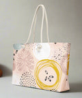 Front view of abstract oversized weekender tote with rope handles