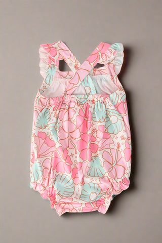 Pink and aqua seashell baby romper with ruffle straps, back view