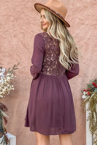 Back view of button-down dress with lace panel and relaxed skirt