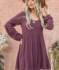 Side view showing bell sleeves and tiered hem detail