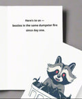 Close-up of inside of raccoon greeting card with funny friendship quote