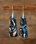 Black and blue natural stone earrings with a unique mineral-inspired pattern and copper accents.