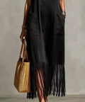 black spaghetti strap maxi dress with fringe hem and pockets