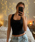 Black ribbed square neck tank top styled for a casual everyday outfit with light wash denim.