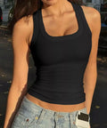 Close-up of a black ribbed square neck tank top featuring a flattering fitted silhouette.