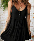 Woman wearing black wide strap mini sun dress with button front