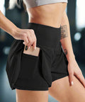 Black Women’s High Waist Running Shorts with phone pocket, shown with smartphone inserted