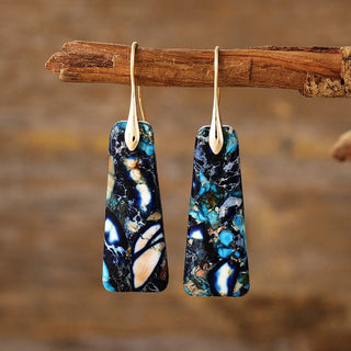 Blue marbled stone earrings with a dangle drop design and elegant gold-plated finish.