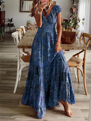 blue floral smocked maxi dress with flowy silhouette for summer outfits