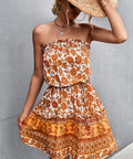 Full outfit with strapless printed mini dress and heels