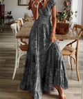 charcoal floral smocked maxi dress with short sleeves and v neckline