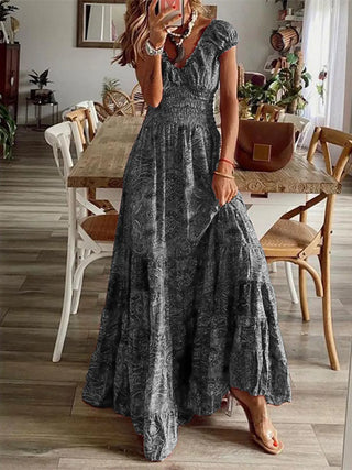 charcoal floral smocked maxi dress with short sleeves and v neckline