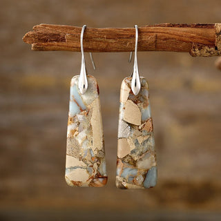 Earth-toned copper and natural stone dangle earrings with a unique handcrafted design.