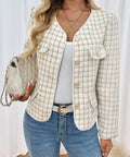 Angled view of a cream and beige plaid textured women’s jacket