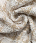 Detailed view of cream plaid woven fabric texture for women’s jacket