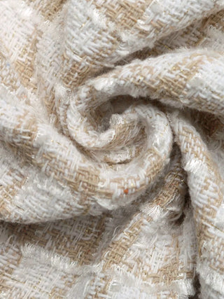 Detailed view of cream plaid woven fabric texture for women’s jacket