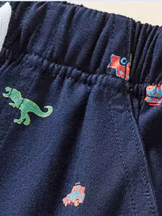 close up of boys dinosaur print cotton shorts with adjustable drawstring waistband