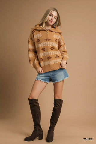 Model posing in half zip fall sweater and tall boots