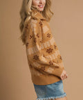 Side angle of woman wearing floral knit pullover