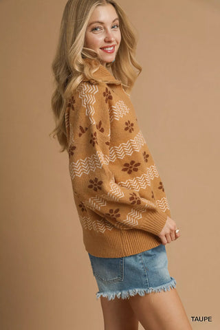 Side angle of woman wearing floral knit pullover