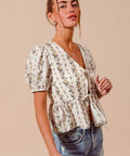 Short sleeve detail on lightweight floral smocked hem blouse