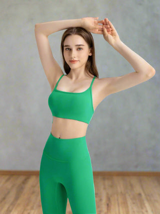 Green workout cami shown in active setting