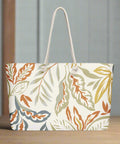 Autumn leaf print tote bag placed on wooden floor with soft lighting