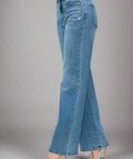 Angled view showing flare leg design on high rise wide leg jeans