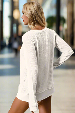 Back view of ribbed long sleeve round neck shirt in ivory