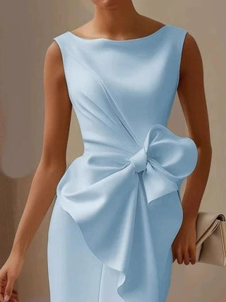 light blue cocktail dress with oversized bow detail for weddings and special events