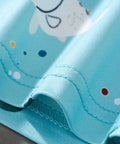 close up of lightweight soft stretch fabric used in kids sea turtle outfit set