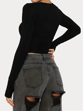 Back view of black fitted long sleeve top