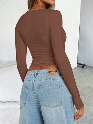 Back view of brown fitted long sleeve top
