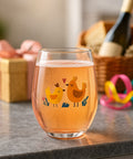 Love birds wine glass filled with rosé, styled with party decor