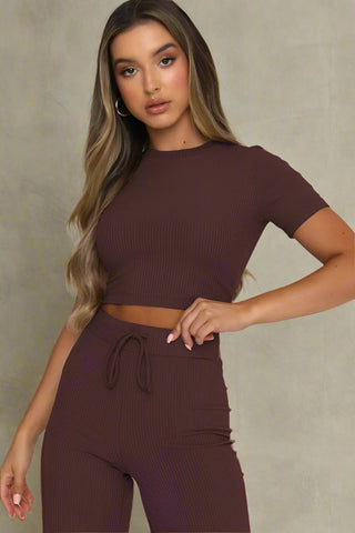 Chocolate brown two piece outfit with crop top and relaxed wide leg pants