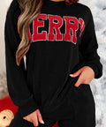 Woman wearing black MERRY holiday lounge set