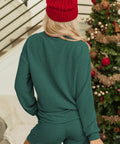 Back view of green holiday lounge set
