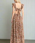 Back view of vintage-inspired mocha floral dress with tie detail