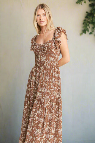 Full-length view of mocha floral dress with tiered skirt and romantic silhouette