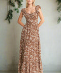 Side view of flowy mocha floral maxi dress with fluttery cap sleeves