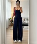 Navy blue spaghetti strap wide leg jumpsuit for vacations, brunch, and casual evenings out.