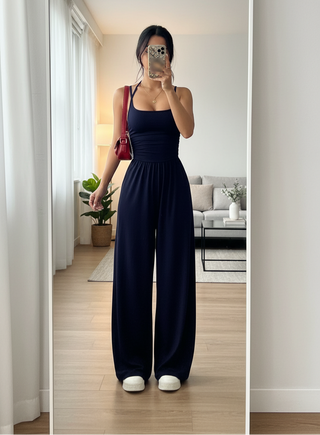 Navy blue spaghetti strap wide leg jumpsuit for vacations, brunch, and casual evenings out.