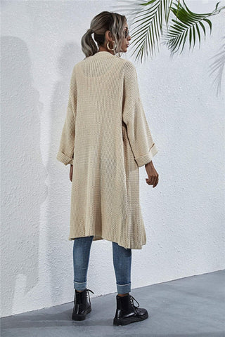 Back view of the cardigan in a longline cut
