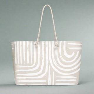 Neutral swirl oversized weekender tote bag with rope handles on display