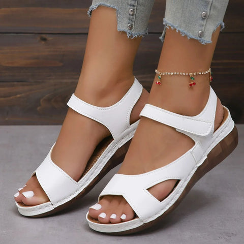 White platform sandals with open toe and comfort straps
