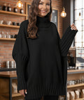 Woman wearing black cozy turtleneck sweater