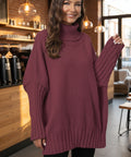 Woman wearing burgundy oversized sweater
