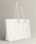 Side view of large tote bag featuring gold leaf design