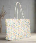 Front view of oversized pastel geometric weekender tote with rope handles