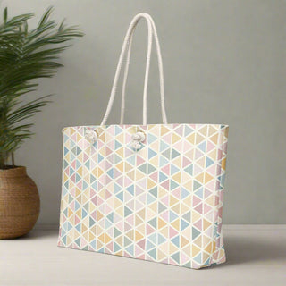 Side angle of large tote bag with pastel geometric pattern